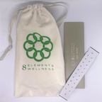 White ear seed strip from 8 Elements Wellness with bag